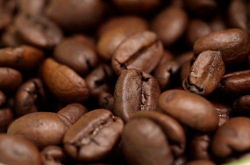 Coffee Beans On Scale by Stocksy Contributor Ibex.media - Stocksy